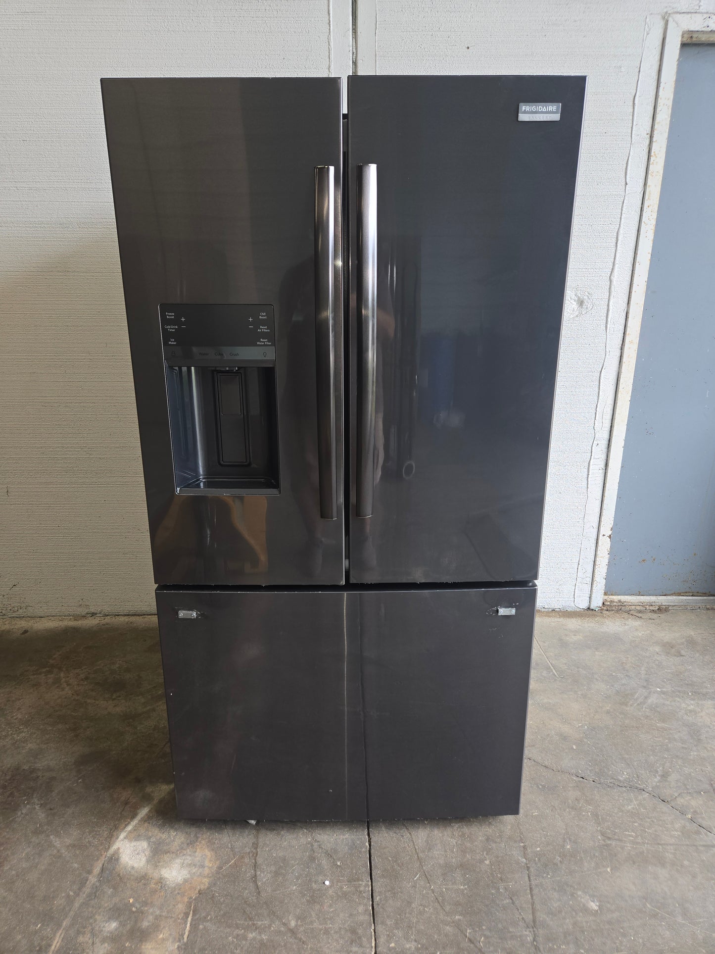 Frigidaire Gallery Standard-Depth 27.8-cu ft 3 -Door French Door Refrigerator with Dual Ice Maker with Water and Ice Dispenser ( Fingerprint Resistant Black Stainless Steel ) ENERGY STAR Certified Model# GRFS2853AD