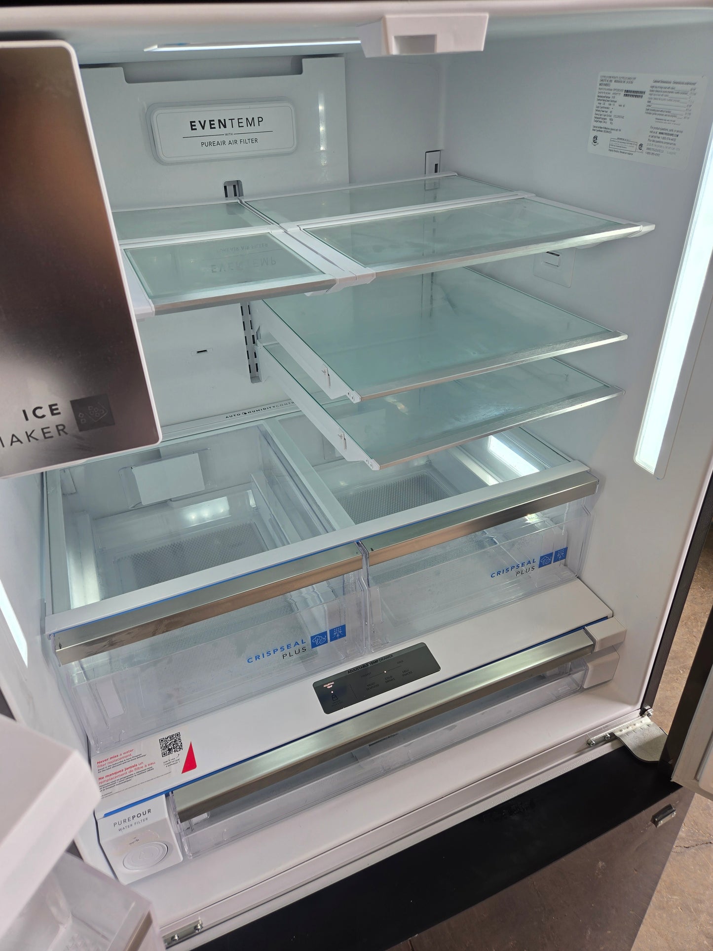 Frigidaire Gallery Standard-Depth 27.8-cu ft 3 -Door French Door Refrigerator with Dual Ice Maker with Water and Ice Dispenser ( Fingerprint Resistant Black Stainless Steel ) ENERGY STAR Certified Model# GRFS2853AD