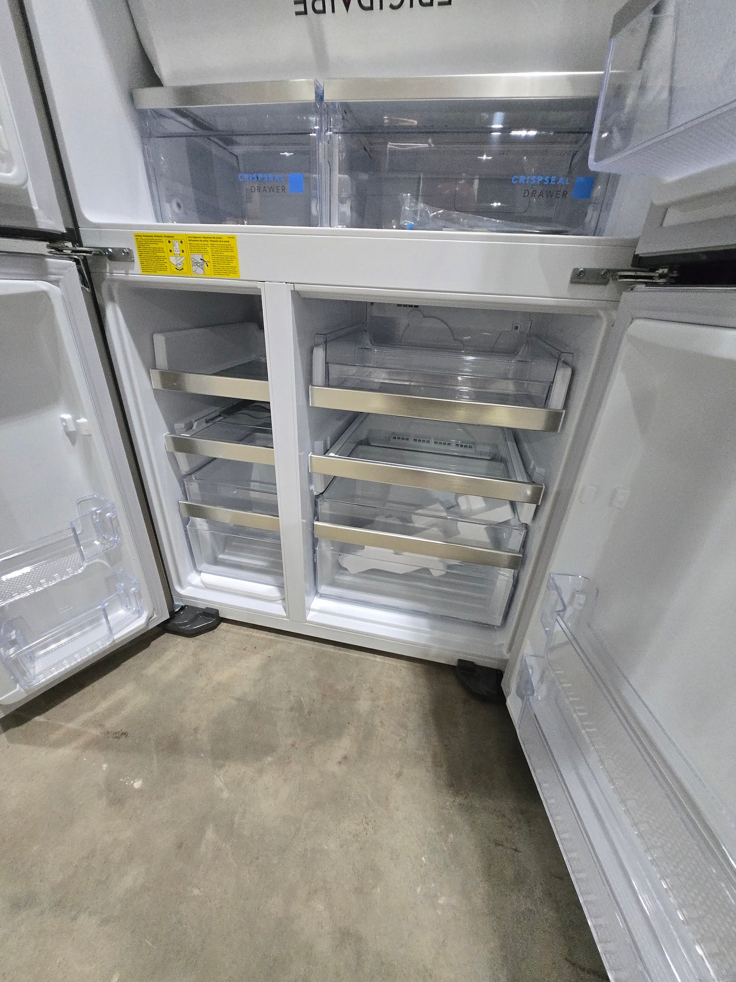 Frigidaire Gallery Counter-Depth 21.5-cu ft 4 -Door French Door Refrigerator with Ice Maker with Water and Ice Dispenser ( Fingerprint Resistant Stainless Steel ) Model# GRQC2255BF