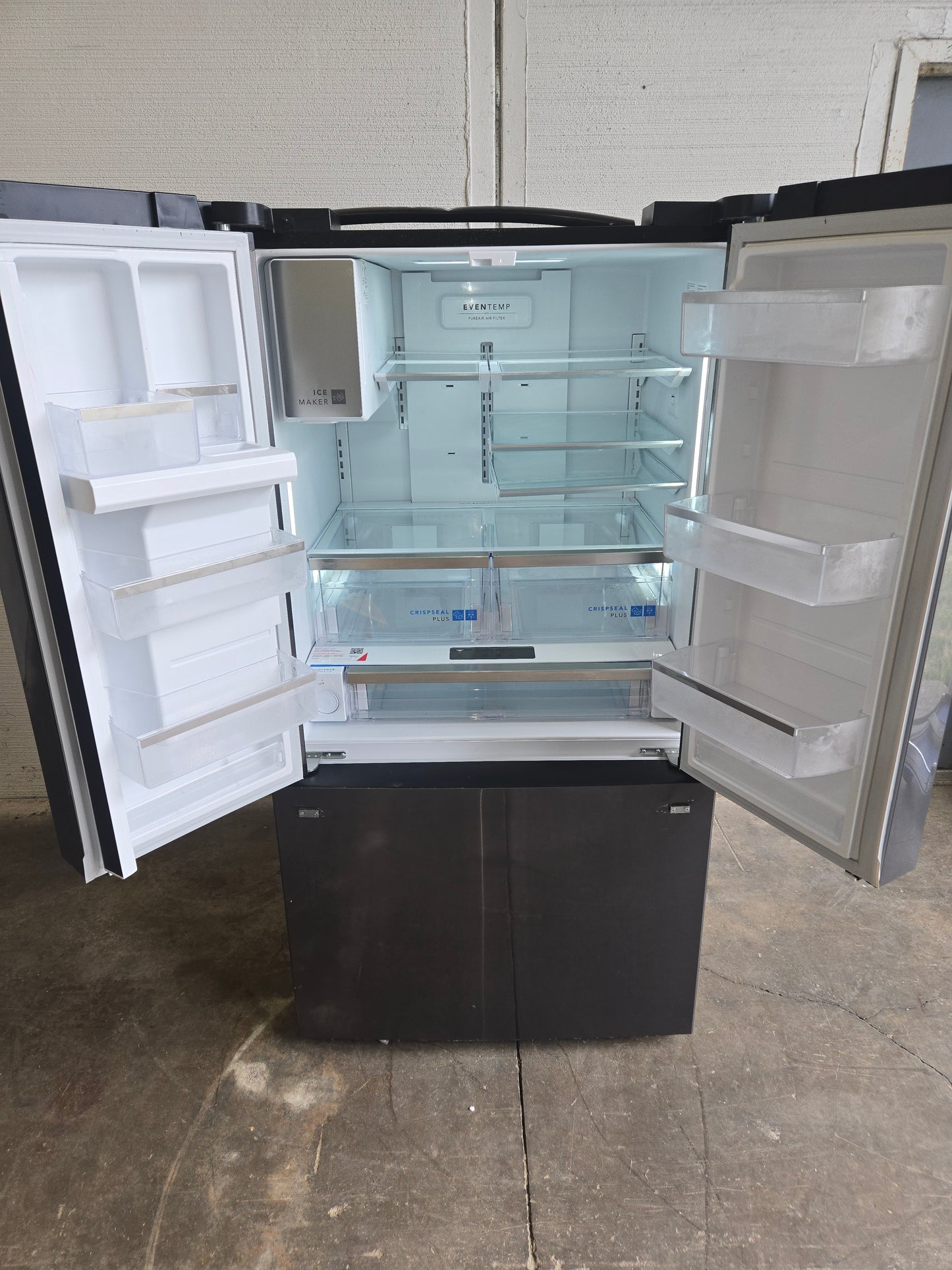 Frigidaire Gallery Standard-Depth 27.8-cu ft 3 -Door French Door Refrigerator with Dual Ice Maker with Water and Ice Dispenser ( Fingerprint Resistant Black Stainless Steel ) ENERGY STAR Certified Model# GRFS2853AD