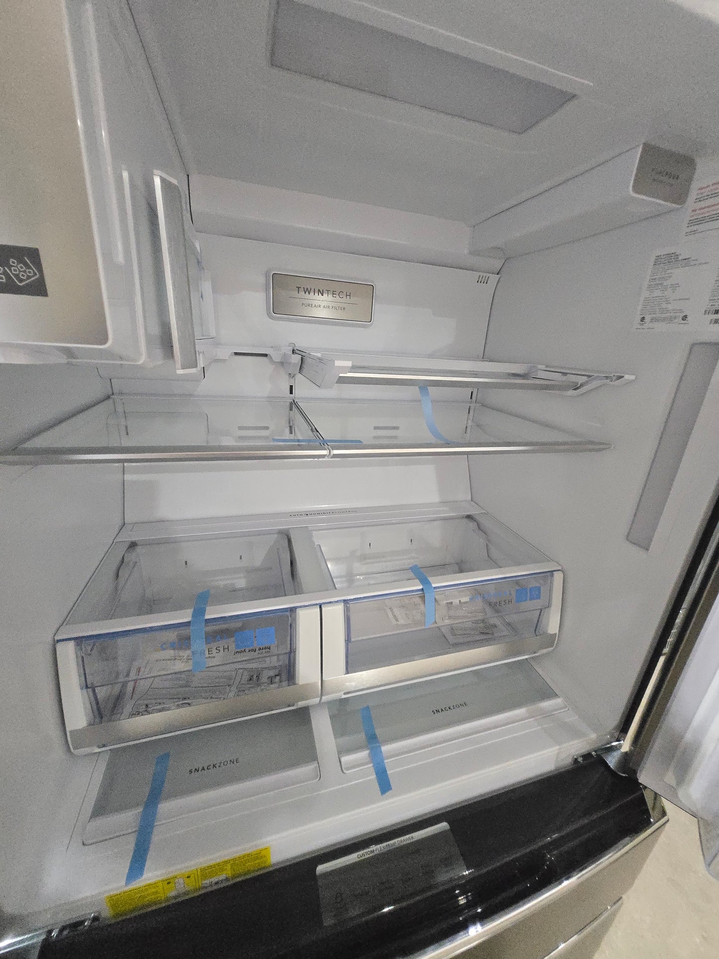 Frigidaire Counter-Depth 21.5-cu ft 4 -Door French Door Refrigerator with Ice Maker with Water and Ice Dispenser ( Smudge-Proof Stainless Steel ) ENERGY STAR Certified Model# GRMC2273CF