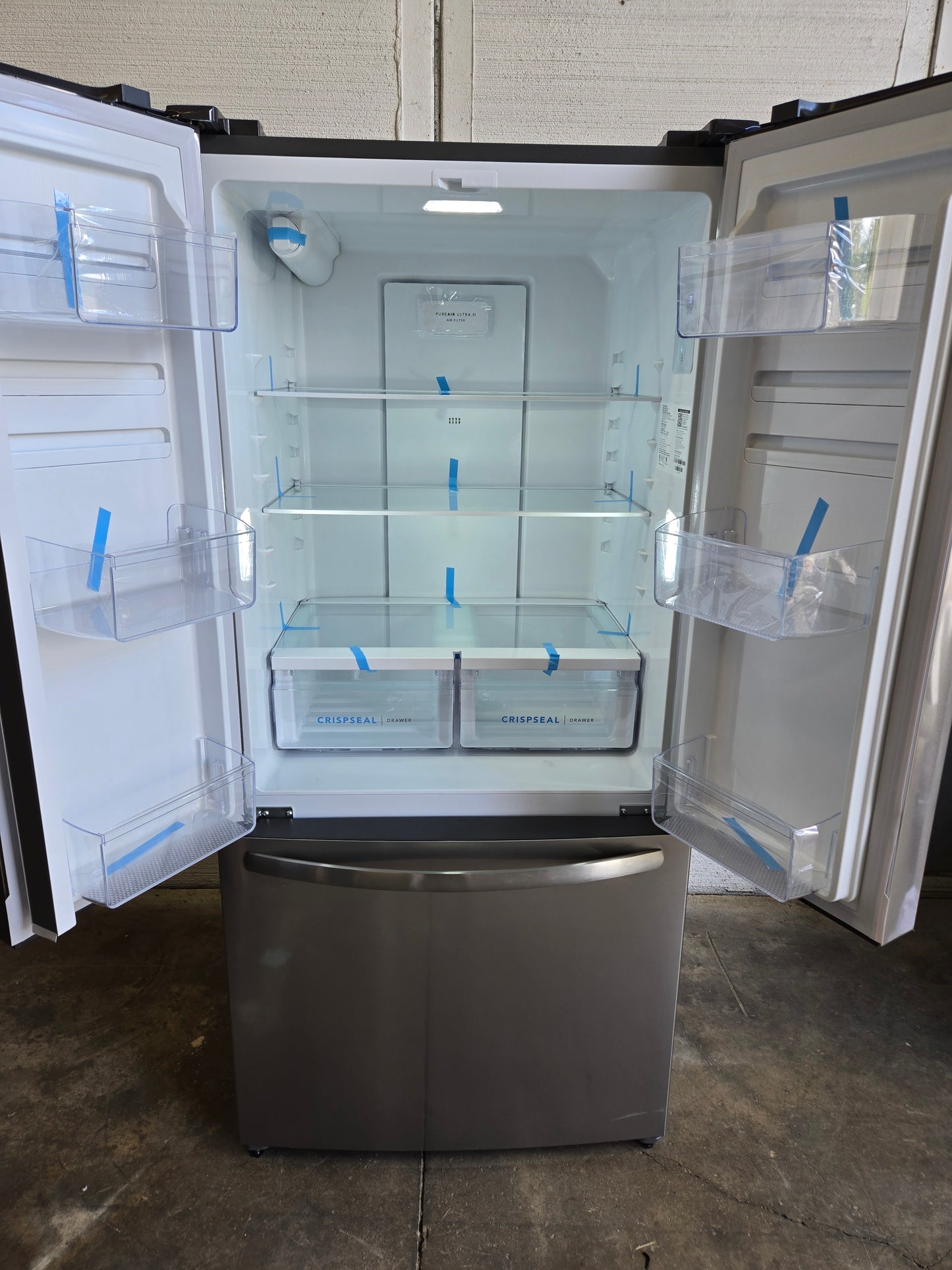 Frigidaire Counter-Depth 17.6-cu ft 3 -Door French Door Refrigerator with Ice Maker ( Fingerprint-Resistant Stainless Look ) ENERGY STAR Certified Model# FRFG1723AV