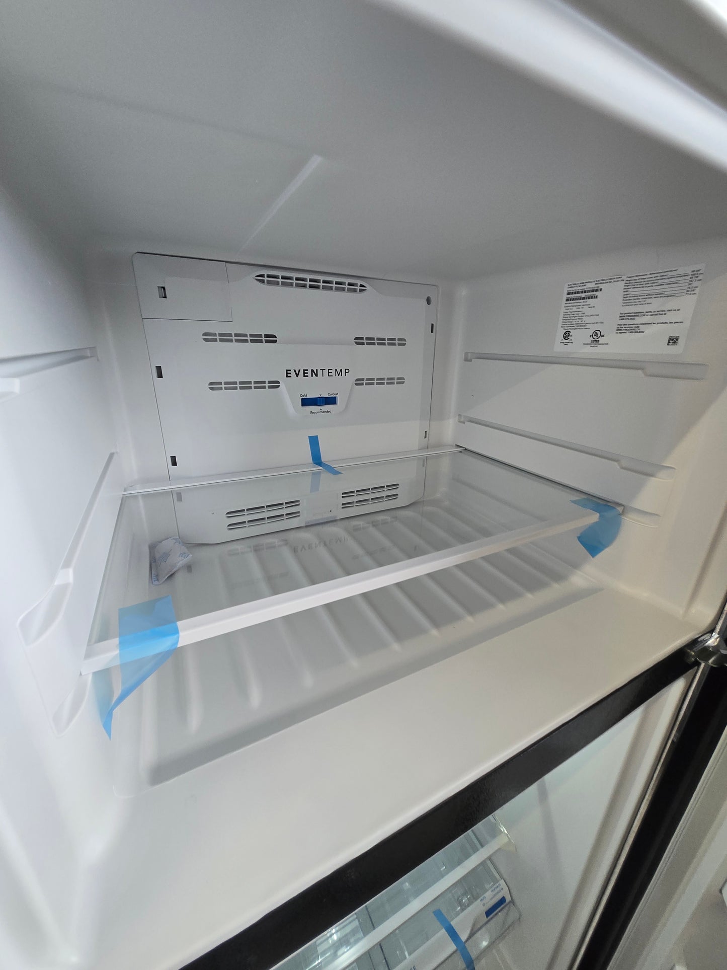 Frigidaire 18.3-cu ft Top-Freezer Refrigerator ( Black ) Garage Ready Model# FFTR1835VB