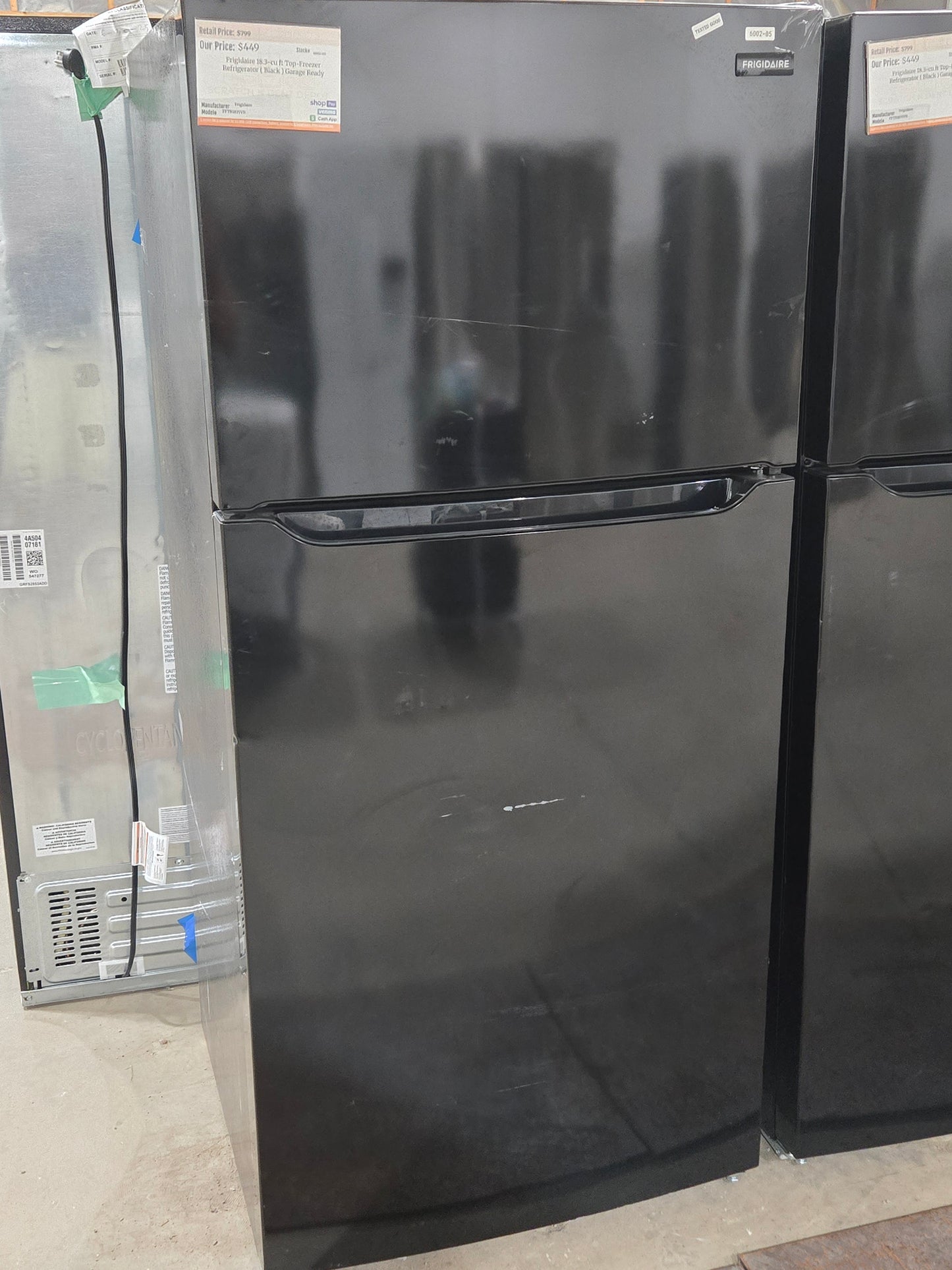 Frigidaire 18.3-cu ft Top-Freezer Refrigerator ( Black ) Garage Ready Model# FFTR1835VB