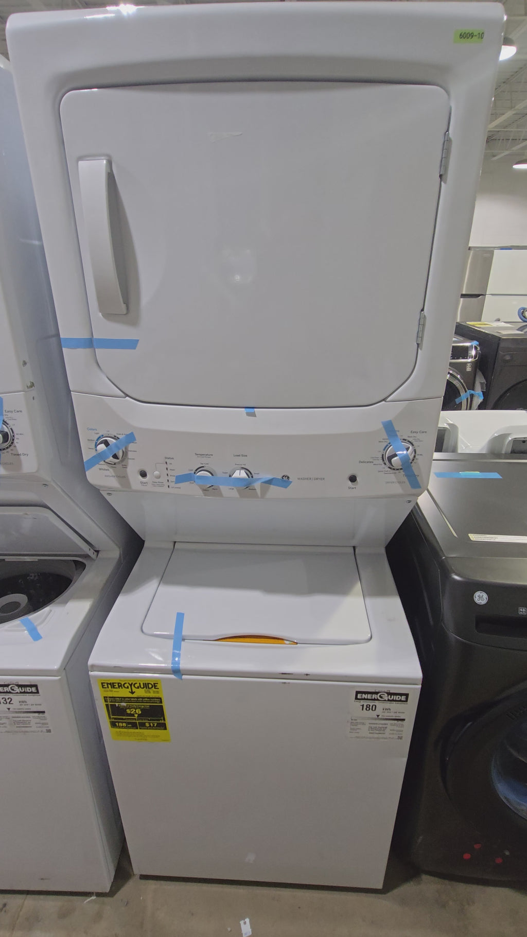 GE Gas Stacked Laundry Center with 3.8-cu ft Top load Washer and 5.9-cu ft Dryer White Model# GUD27GSSMWW