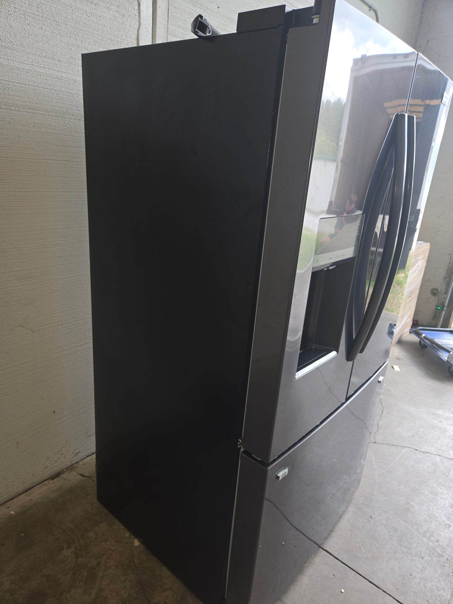 Frigidaire Gallery Standard-Depth 27.8-cu ft 3 -Door French Door Refrigerator with Dual Ice Maker with Water and Ice Dispenser ( Fingerprint Resistant Black Stainless Steel ) ENERGY STAR Certified Model# GRFS2853AD