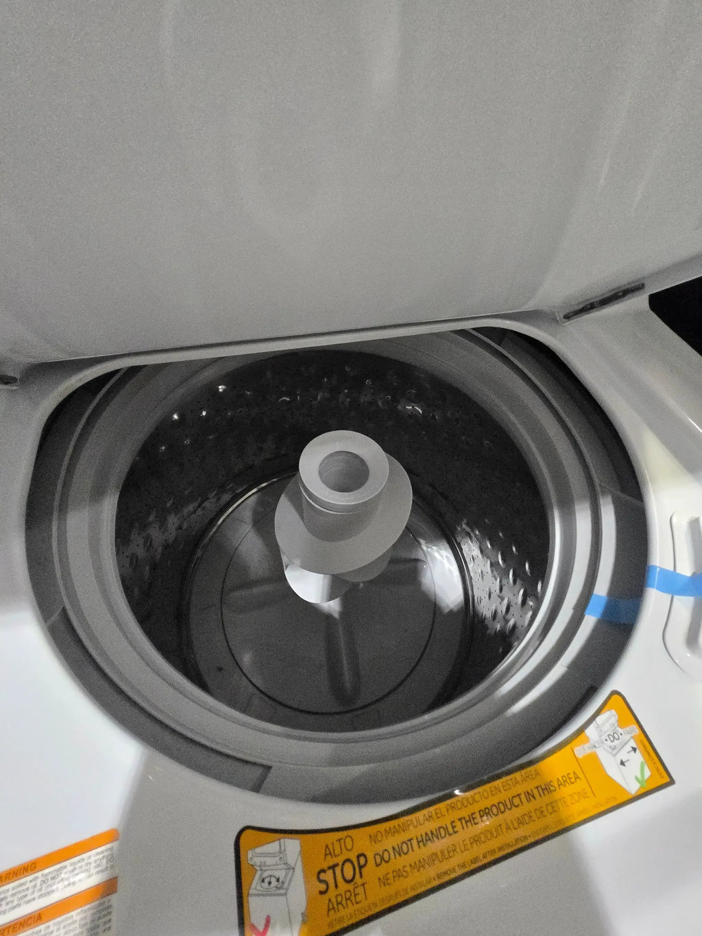 GE Gas Stacked Laundry Center with 3.8-cu ft Top load Washer and 5.9-cu ft Dryer White Model# GUD27GSSMWW by Scratch N Dent Depot